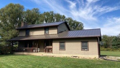 Bronze rib-panel metal roof on a Lancaster home in Fairfield County