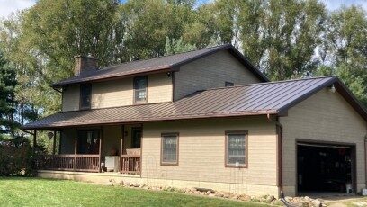 Bronze rib-panel metal roof with snow guards in Lancaster, Ohio
