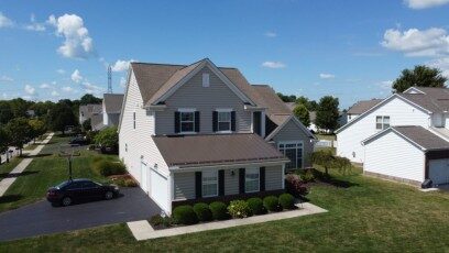 Bronze standing-seam roof on a northwest Columbus metro home