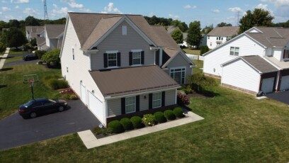 Front view of a bronze standing-seam metal roof on a Hilliard, Ohio home
