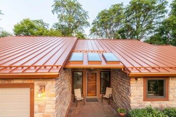 Copper-colored standing-seam metal roof on a Westerville home